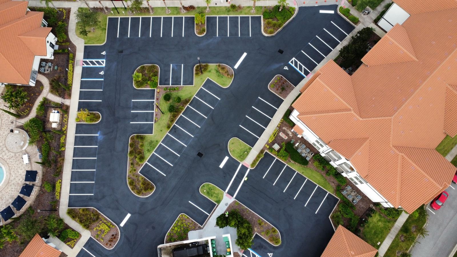 Aerial view of a newly striped multi-family parking lot in Tampa